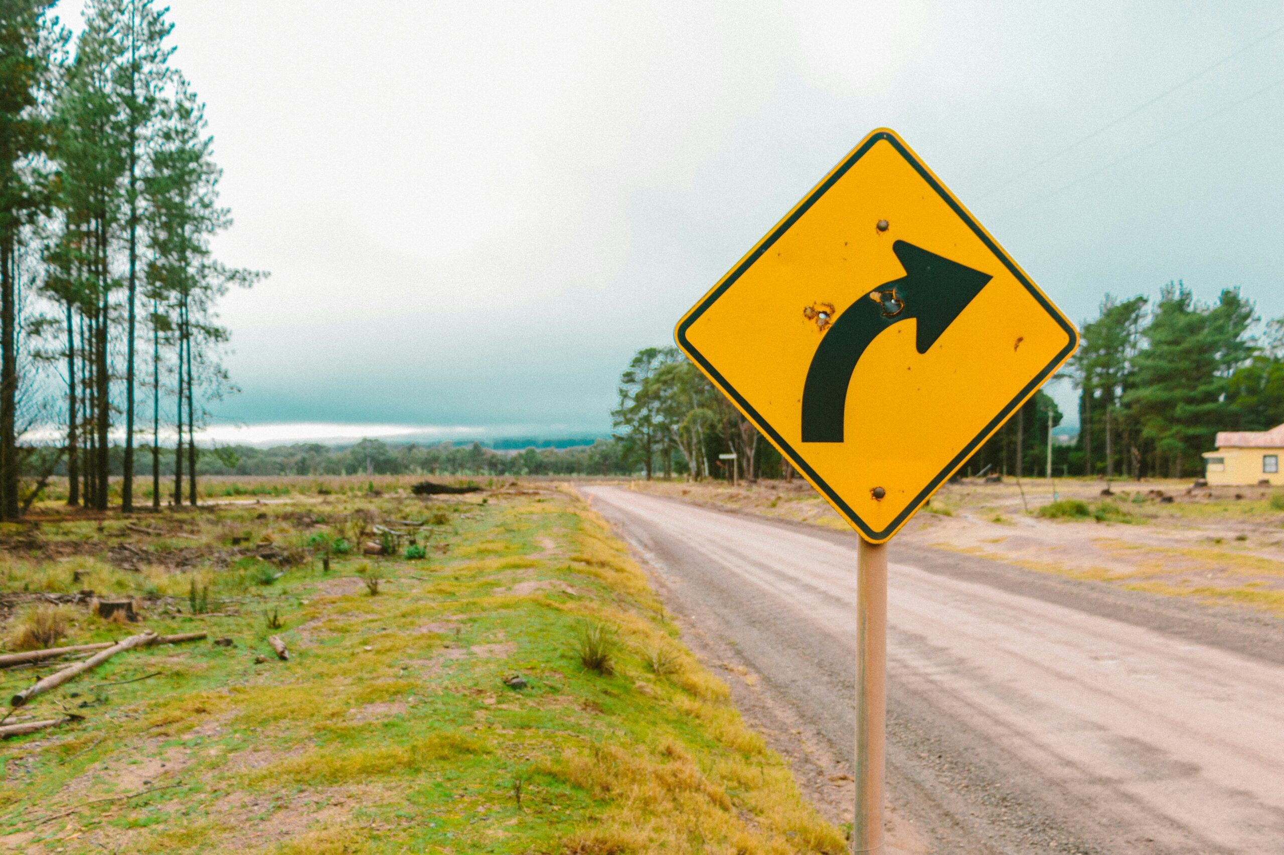 Traffic curve warning sign on Australian road